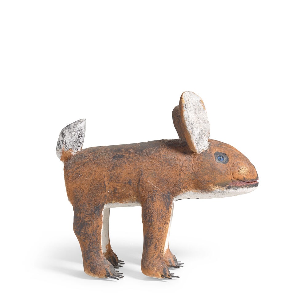 A Felipe Benito Archuleta sculpture, Rabbit, 1981: Felipe Benito Archuleta New Mexico, (1910-1991), 'Rabbit', 1981, carved and painted cottonwood with mixed media details, dated 3-19-81 and signed 'F.B.A.' on the belly. height 13in, length 15