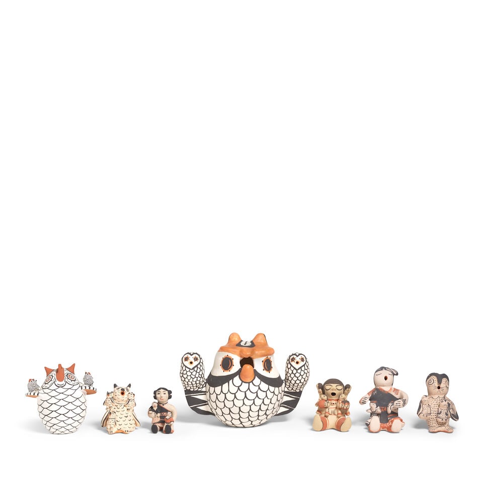 Seven Pueblo pottery storyteller figures: Seven Pueblo pottery storyteller figures Including four owls: the largest signed 'Antonio', (Acoma Pueblo, 20th century); the next dated 1996, S.K. Seowtewa (Zuni, 20th century); the smallest by