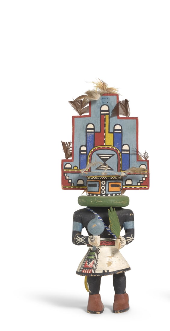 A Hopi katsina figure: A Hopi katsina figure Depicting Sio Hemis, with prominent tableta and animated stance. height 14in For further information on this lot please visit Bonhams.com For further information about this lot