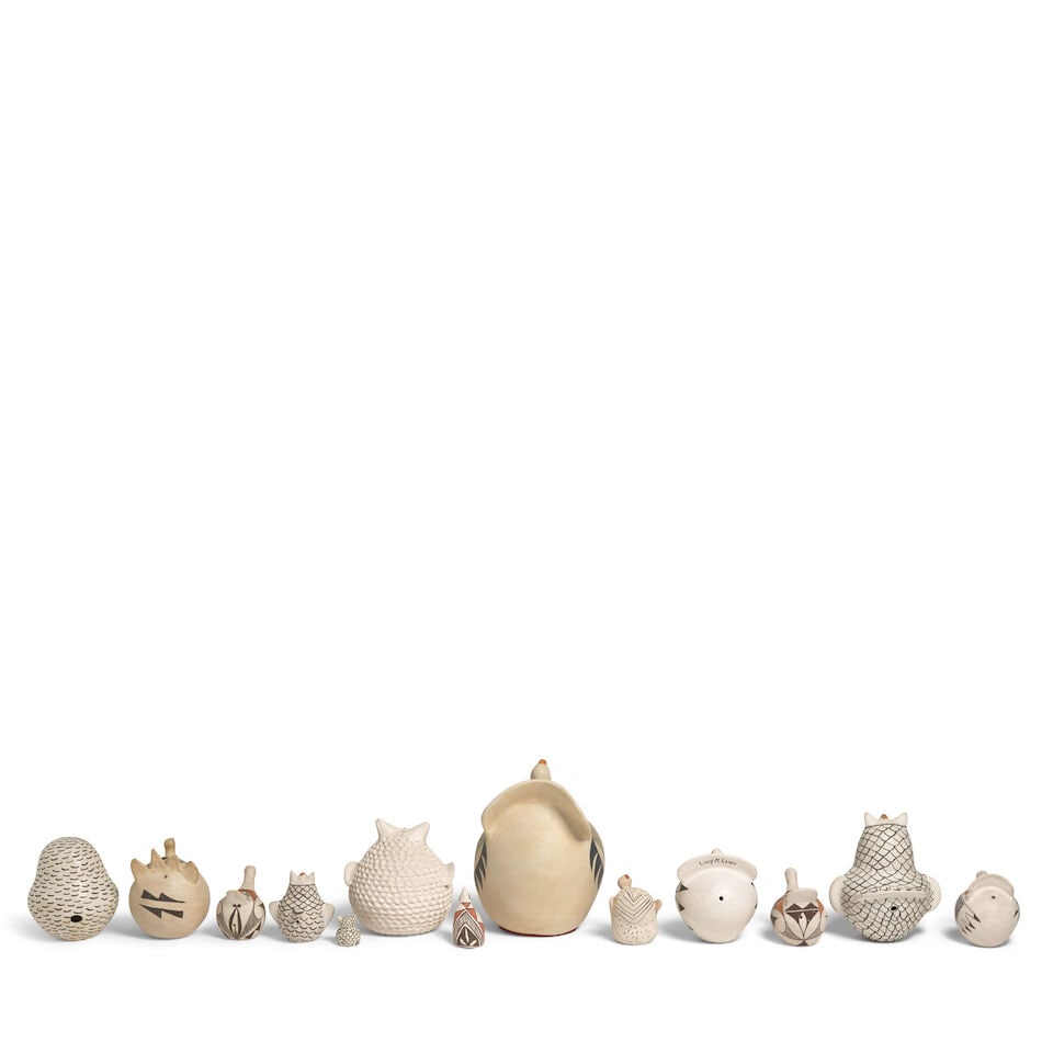 A collection of twelve Acoma pottery birds - 2