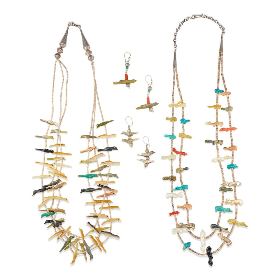 Two Zuni fetish necklaces: Two Zuni fetish necklaces Comprising a three-strand bird-motif fetish necklace by Andrew Emerson Quam (1943-1976) and a two-strand multi-animal fetish necklace by Tony Luala (20th century); together