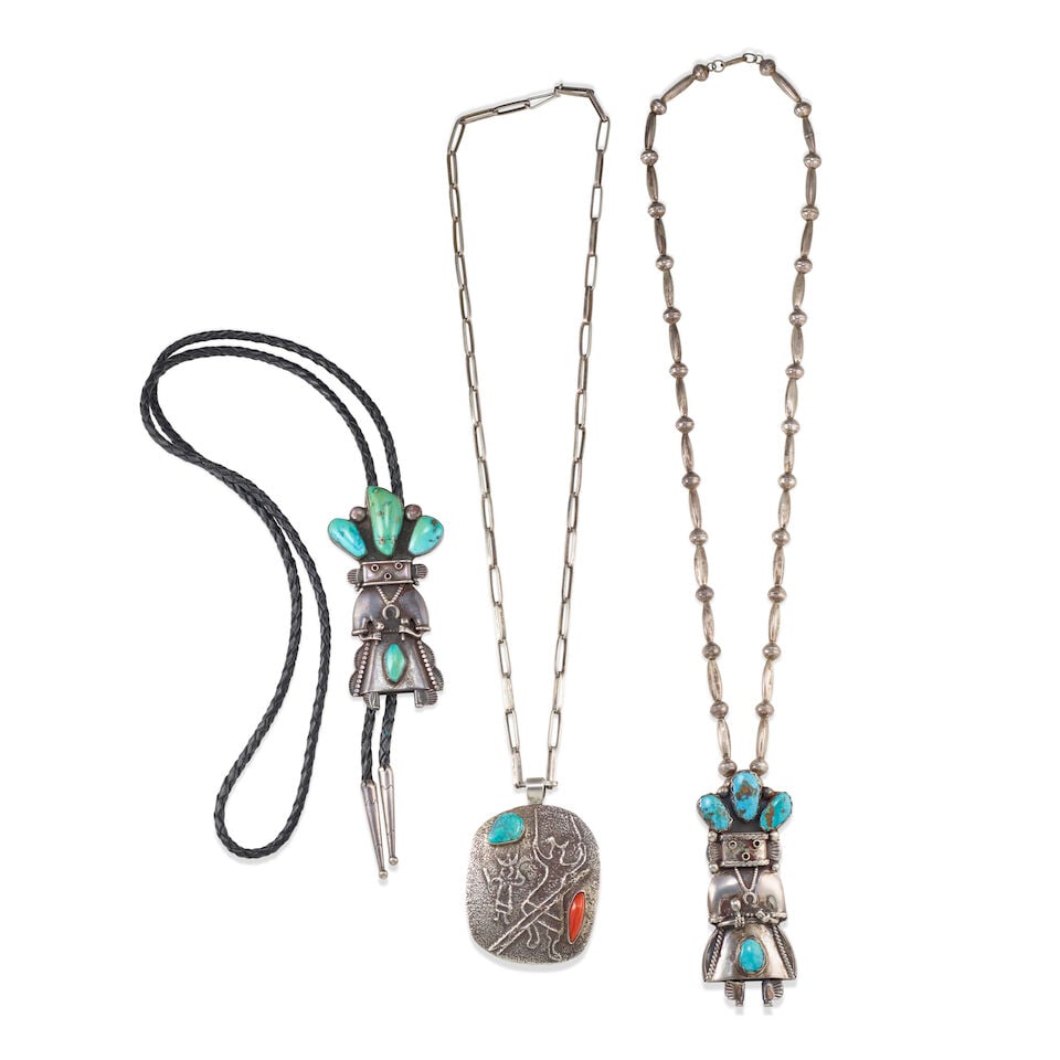 Three katsina or related silver adornments: Three katsina or related silver adornments Comprising a katsina-form bolo tie set with four turquoise stones; a similar katsina-form pendant set with four turquoise and strung on a silver bead