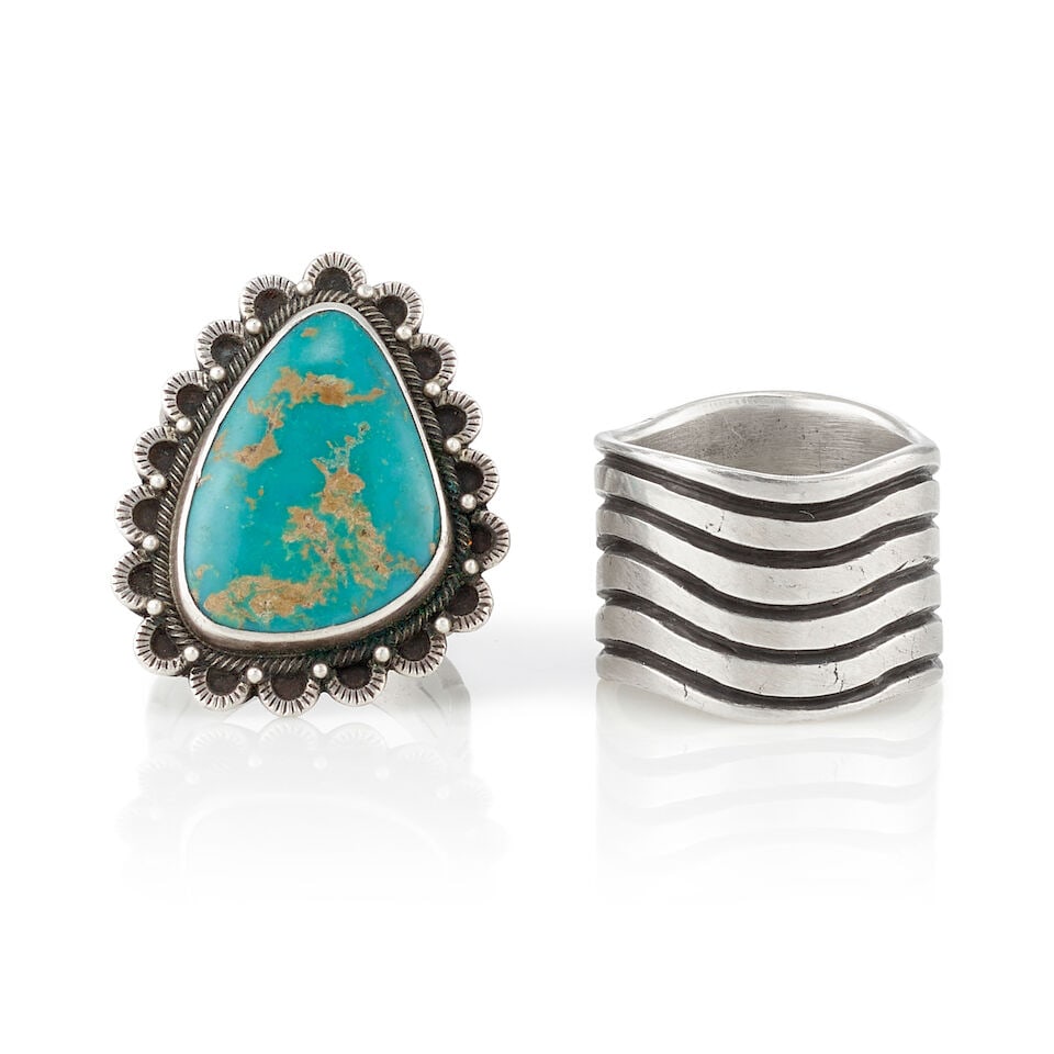 Two Perry Shorty silver rings: Perry Shorty Diné (Navajo), (b. 1964), two rings, including a sterling silver example with oblong turquoise cabochon set in a fine ropework frame with scalloped edges, petite silver drop accents,