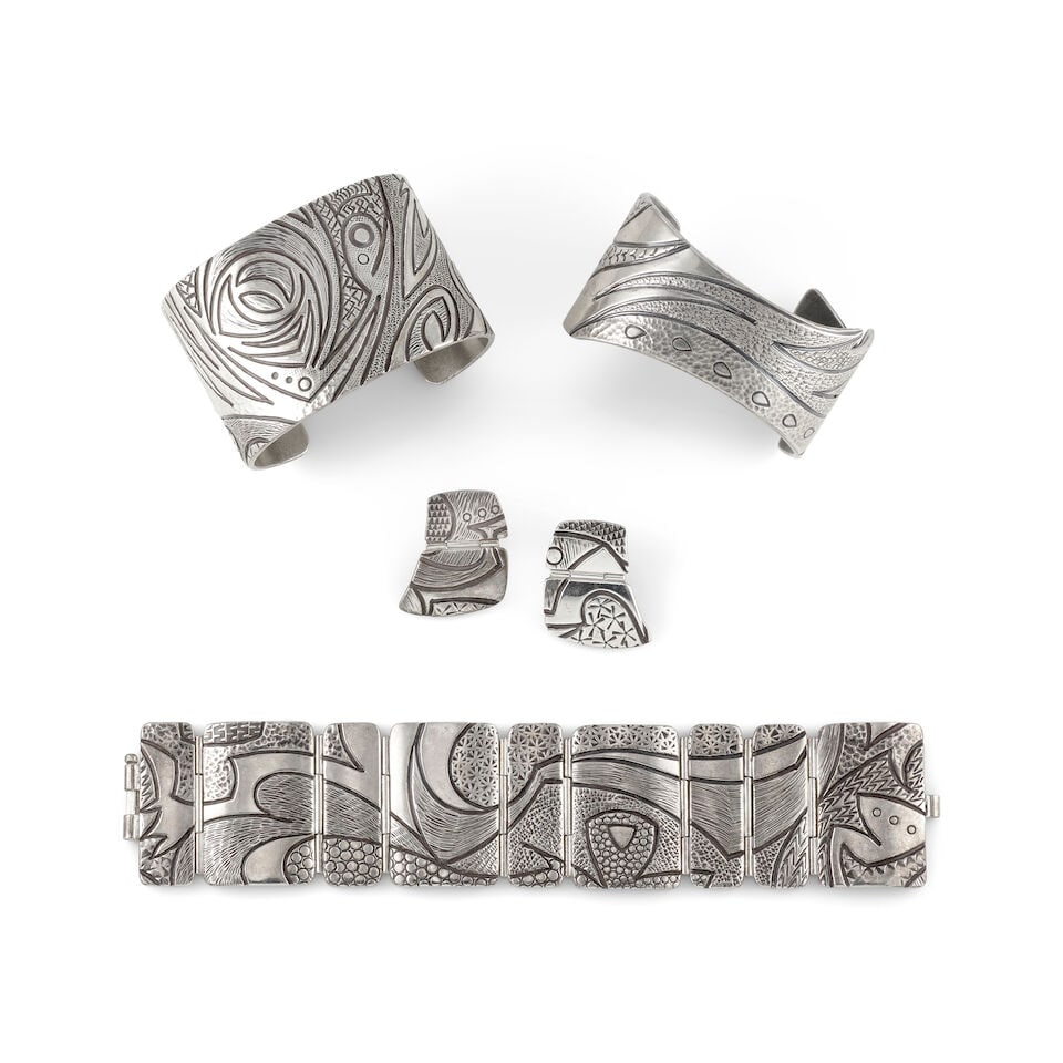 A group of Jared Chavez silver jewelry, including two cuff bracelets, a link bracelet and matchi... (1 of 1)