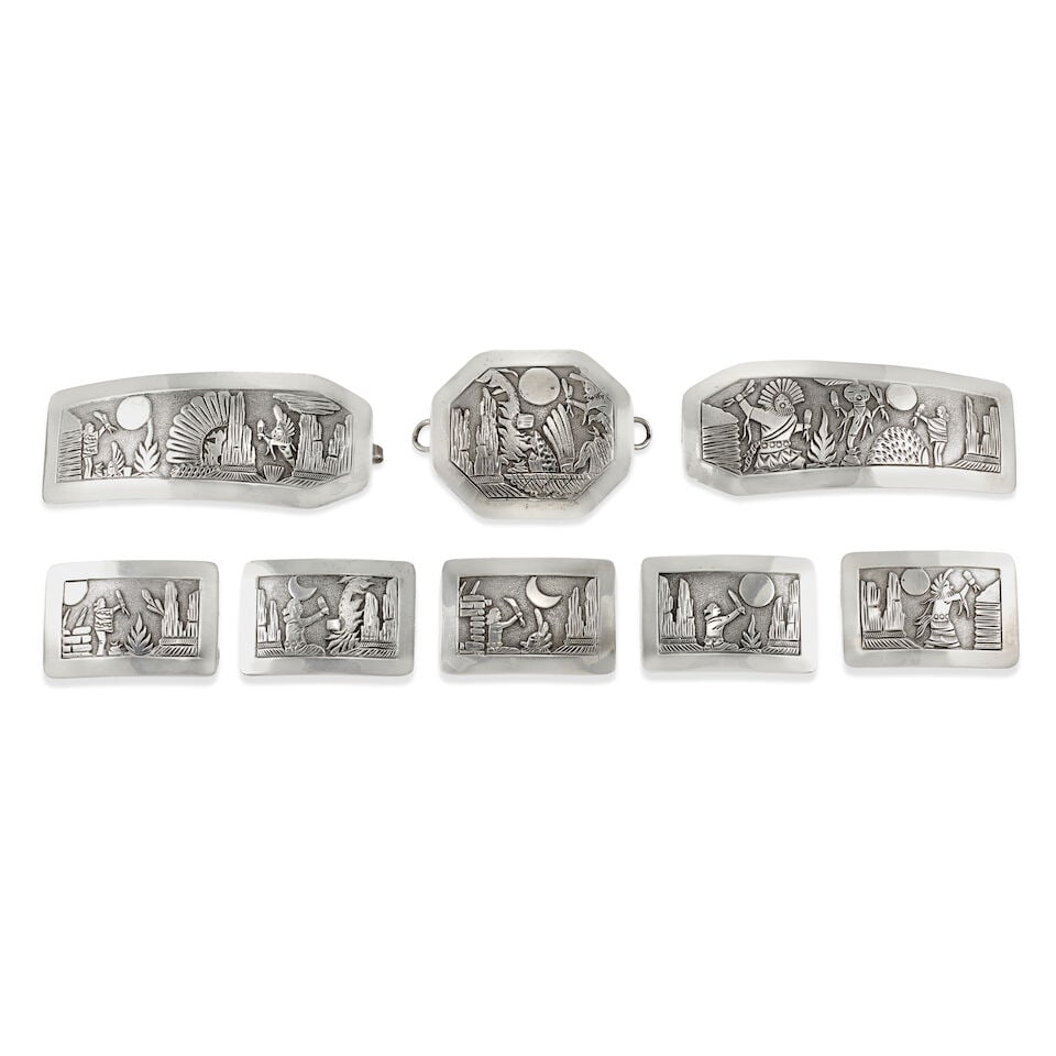 A Floyd Becenti storyteller concha belt, 'Sacred Way': Floyd Becenti Diné (Navajo), b. 1960, 'Sacred Way,' a silver storyteller concha belt, designed with a three-part buckle and five rectangular conchas, each depicting a Katsina-motif nocturnal