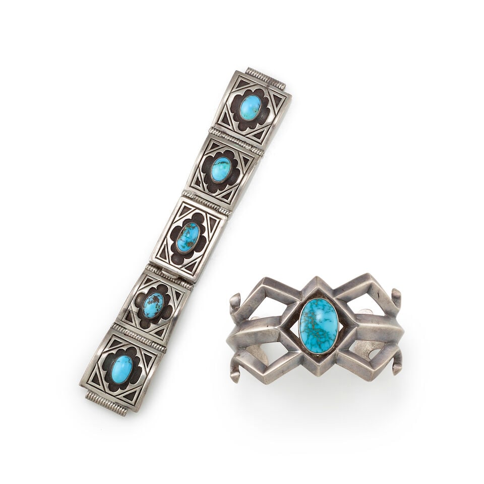 Two Southwest silver and turquoise bracelets: Two Southwest silver and turquoise bracelets Comprising a Diné (Navajo) sand-cast cuff centering an oval turquoise; and a watch cuff in a link bracelet style, each link set with an oval