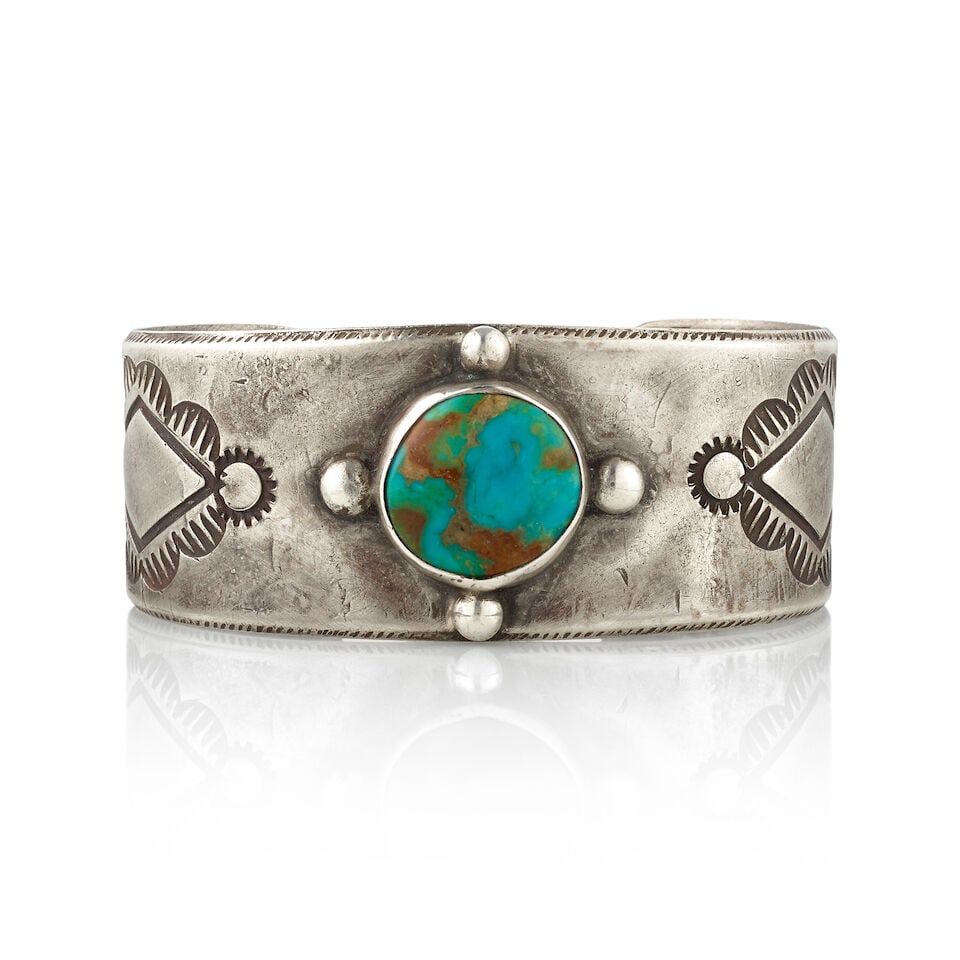 A Southwest silver and turquoise cuff bracelet (1 of 3)