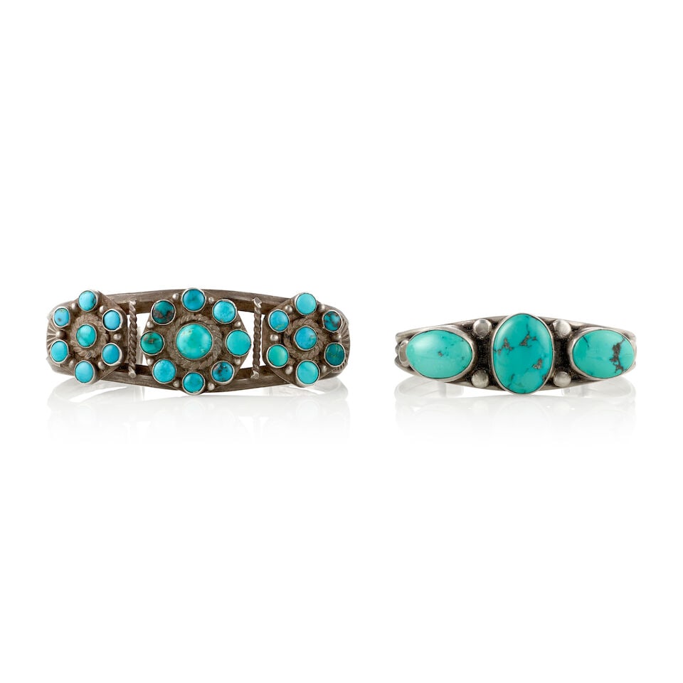 Two Diné (Navajo) cuff bracelets: Two Diné (Navajo) cuff bracelets Each of silver set with turquoise, the first set with three clusters of round turquoise separated by twister wires, the second set with three oval turquoise