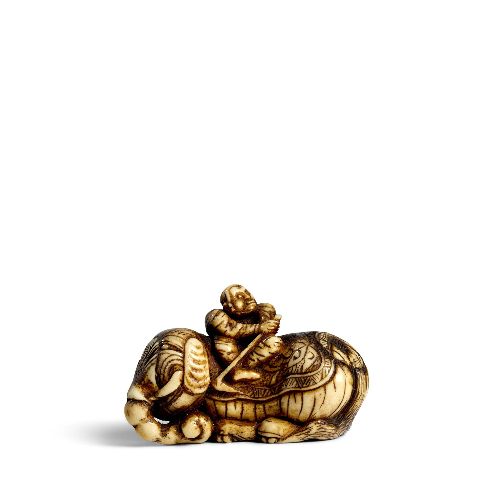 A LARGE STAG-ANTLER NETSUKE OF A FIGURE ON AN ELEPHANT Edo period (1615-1868) or Meiji era (1868... (1 of 1)