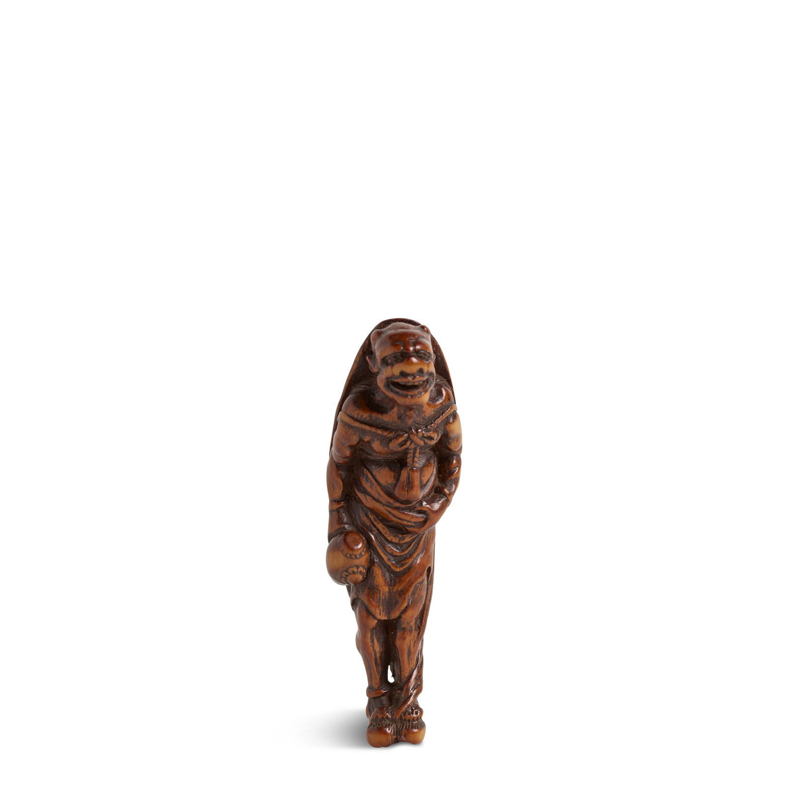 FUJI ISSHŪ (ACTIVE 18TH CENTURY) A Fine Wood Netsuke of a Long-Haired Oni (Demon) Edo perio...: FUJI ISSHŪ (ACTIVE 18TH CENTURY) A Fine Wood Netsuke of a Long-Haired Oni (Demon) Edo period (1615-1868), 18th century Carved as an oni standing on tiptoe holding a large wood mallet and clutchin