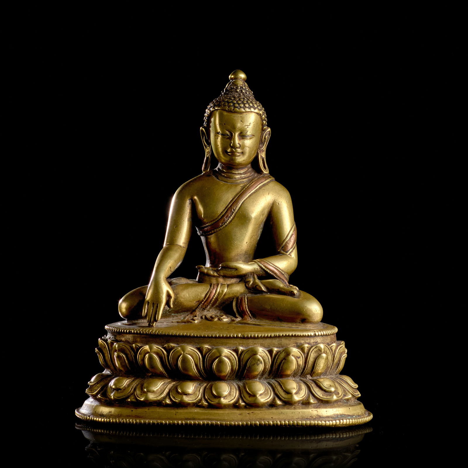 A COPPER AND SILVER-INLAID BRASS FIGURE OF BUDDHA TIBET, CIRCA 14TH CENTURY: A COPPER AND SILVER-INLAID BRASS FIGURE OF BUDDHA TIBET, CIRCA 14TH CENTURY Himalayan Art Resources item no. 90355 5 3/4 in. (14.6 cm) high Footnotes: 西藏 約十四世