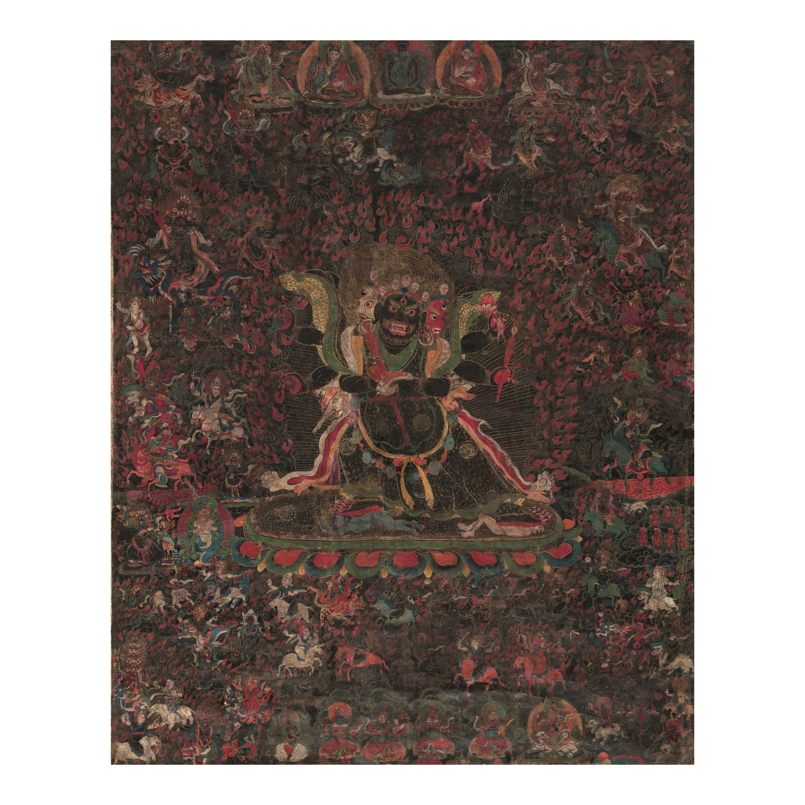 A BLACKGROUND THANGKA OF SHADBHUJA MAHAKALA TIBET, 18TH CENTURY: A BLACKGROUND THANGKA OF SHADBHUJA MAHAKALA TIBET, 18TH CENTURY Distemper and gold on cloth; verso inscribed with a Tibetan 'om, ah, hum' incantation in red ink behind the primary figure. Himalayan Ar