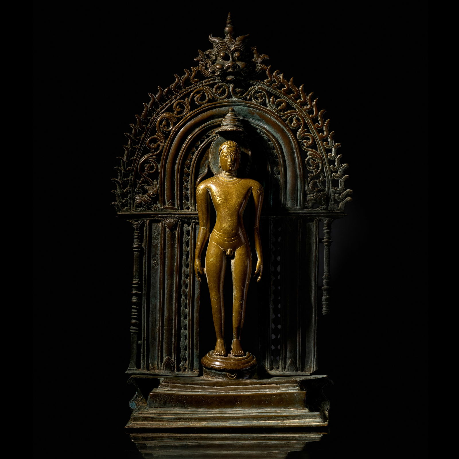 A LARGE COPPER ALLOY JINA SHRINE KARNATAKA, GANGA PERIOD, 9TH CENTURY: A LARGE COPPER ALLOY JINA SHRINE KARNATAKA, GANGA PERIOD, 9TH CENTURY 21 5/8 in. (54.9 cm) high Footnotes: Published Robert J. Del Bonta, The Pursuit of Salvation: Jain Art from India, New Orleans Mus