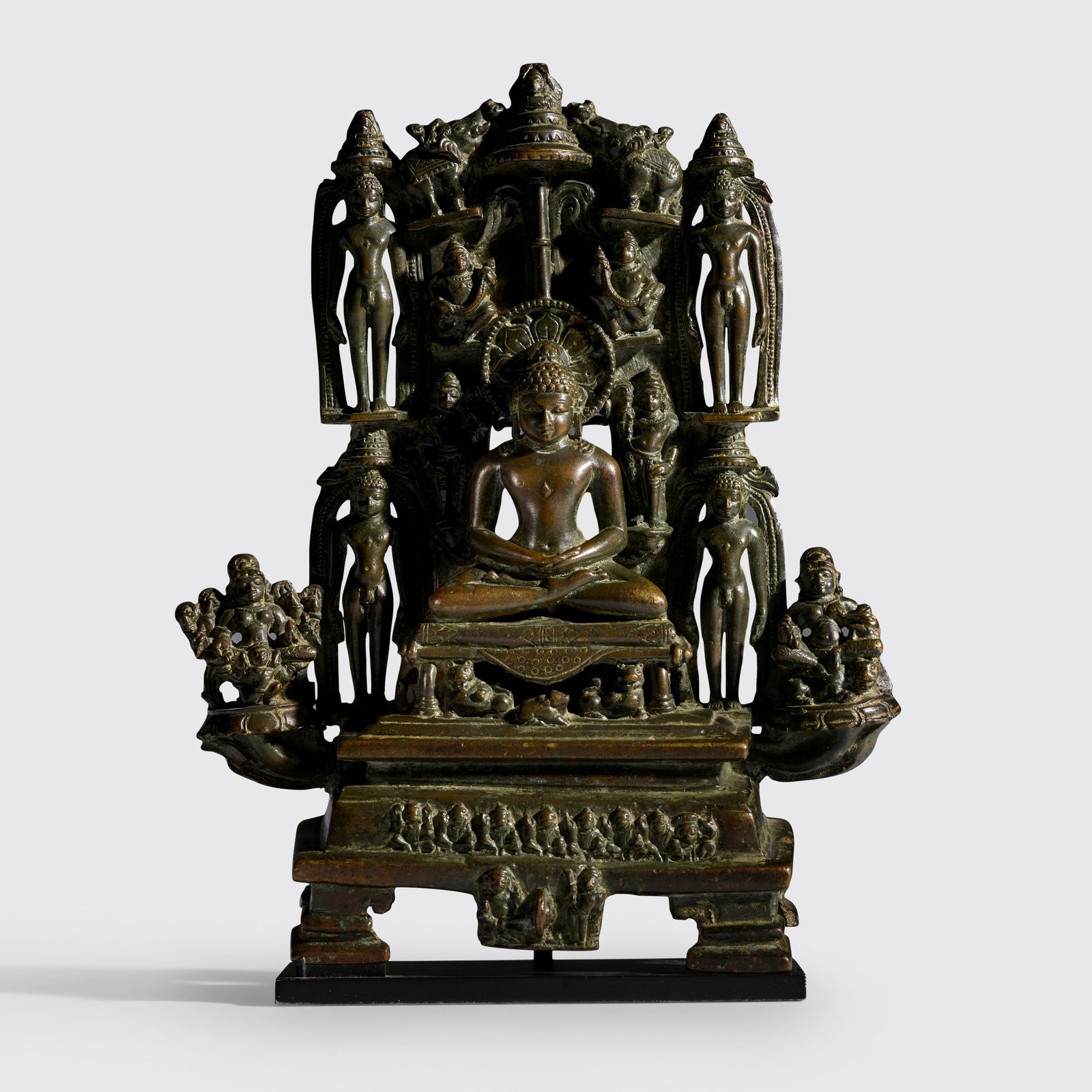 A COPPER ALLOY PANCATIRTHA OF RISHABANATHA MADHYA PRADESH, CHANDELLA PERIOD, DATED 1011 CE: A COPPER ALLOY PANCATIRTHA OF RISHABANATHA MADHYA PRADESH, CHANDELLA PERIOD, DATED 1011 CE Inscribed at the back with a single line inscription dated Samvat 1068 (1011 CE). 8 1/2 in. (21.5 cm) high Fo