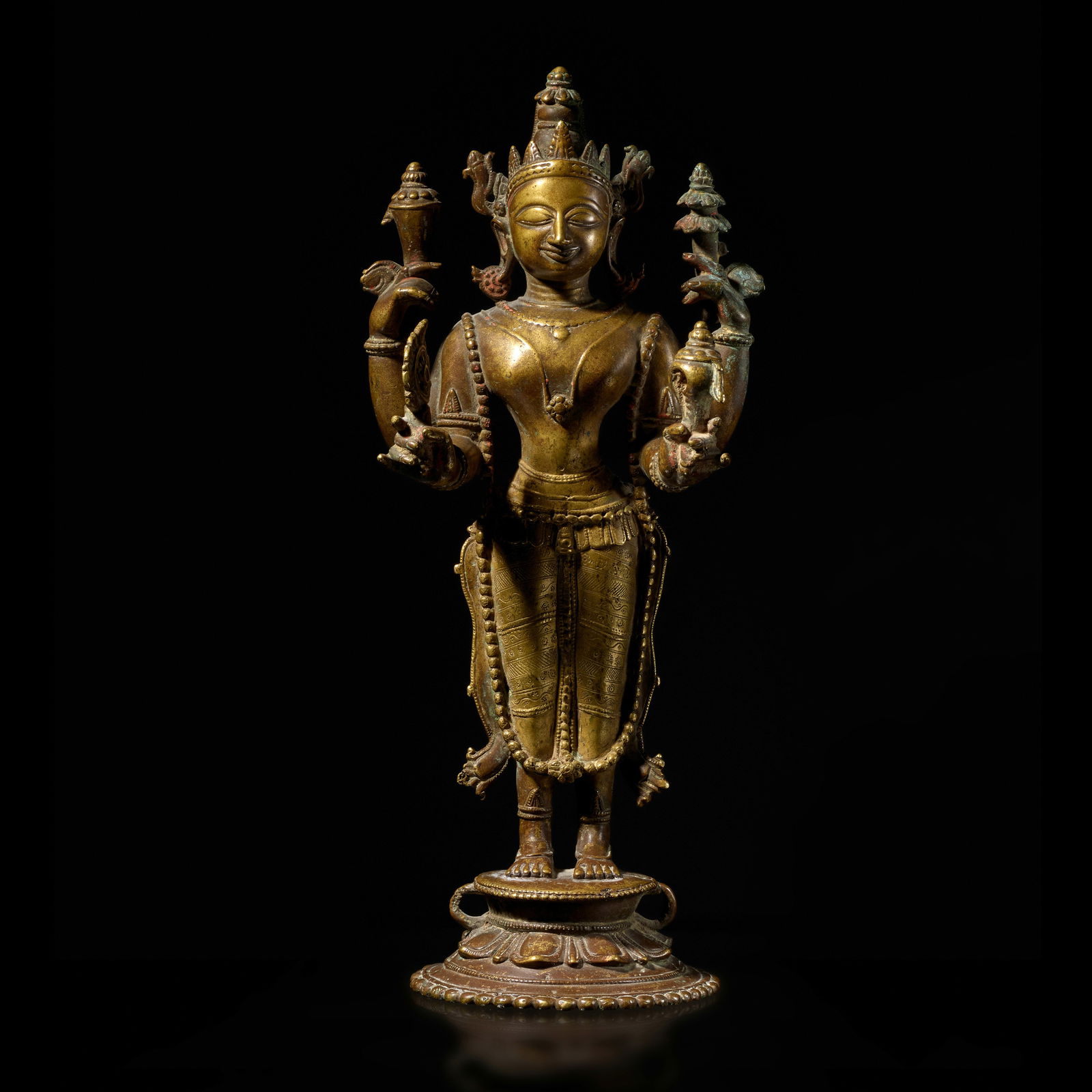 A BRASS FIGURE OF VISHNU ORISSA, 16TH CENTURY: A BRASS FIGURE OF VISHNU ORISSA, 16TH CENTURY 12 1/2 in. (31.8 cm) high Footnotes: Provenance Dorotheum, Austria, 2 December 2015, lot 15. Vishnu stands in samabhanga, an upright, balanced pose