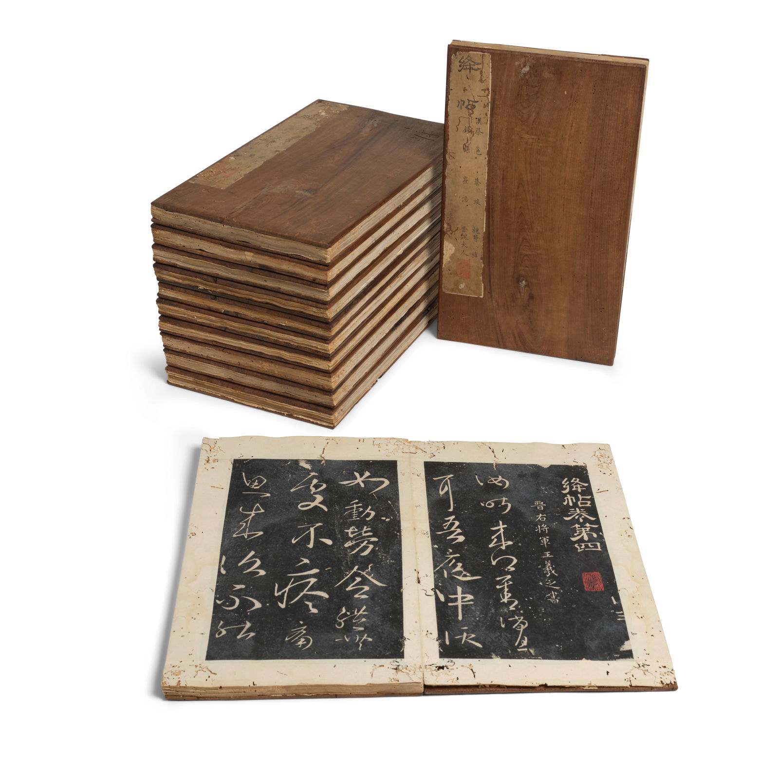 CALLIGRAPHIC RUBBINGS JIANG-TIE 18th/19th century: CALLIGRAPHIC RUBBINGS JIANG-TIE 18th/19th century Twelve volumes, ink on paper, with wooden book covers, with one collector's seal. 13 x 7 3/4in (33 x 19 5/8cm) Footnotes: 《絳帖