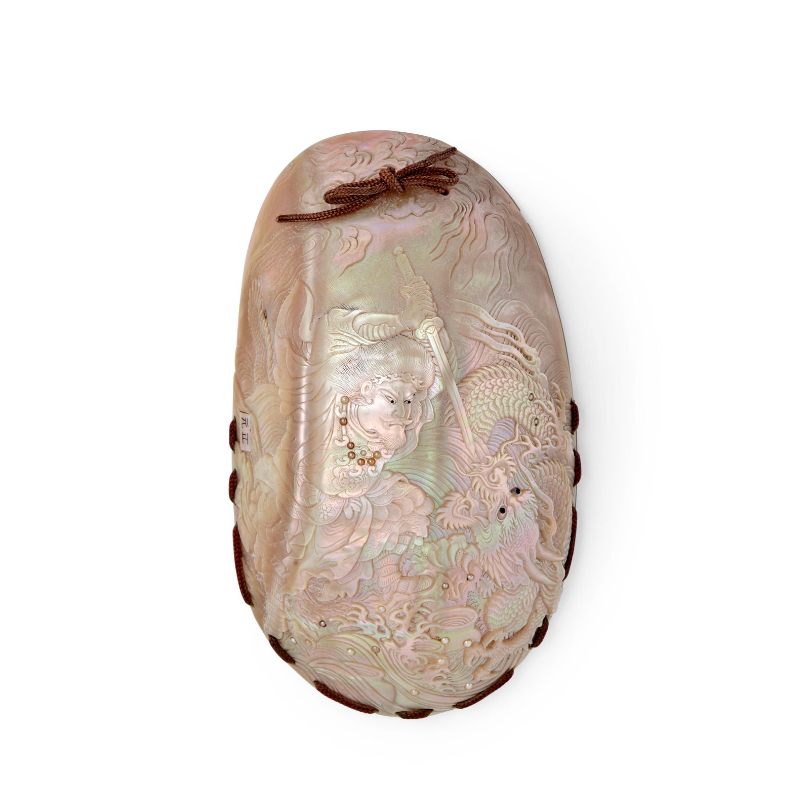 A SHELL TONKOTSU (TOBACCO BOX) Meiji era (1868-1912), late 19th century: A SHELL TONKOTSU (TOBACCO BOX) Meiji era (1868-1912), late 19th century The mother-of-pearl box carved with Susano-o no Mikoto (the 'Impetuous Male Deity') slaying an intoxicated dragon, details inlai