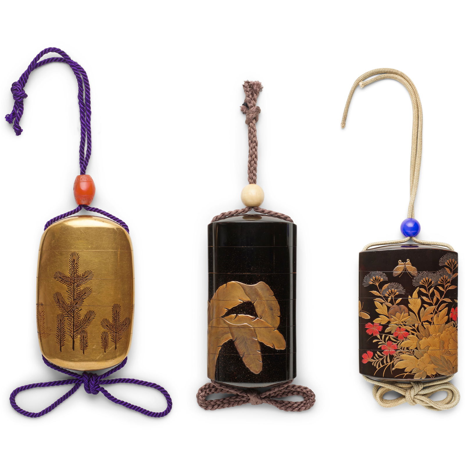 THREE INRŌ (MEDICINE CONTAINERS) Edo period (1615-1868) and Meiji era (1868-1912), 19th cen...: THREE INRŌ (MEDICINE CONTAINERS) Edo period (1615-1868) and Meiji era (1868-1912), 19th century The first of squared-off lenticular plan with integral himotōshi, four cases, decorated in gol