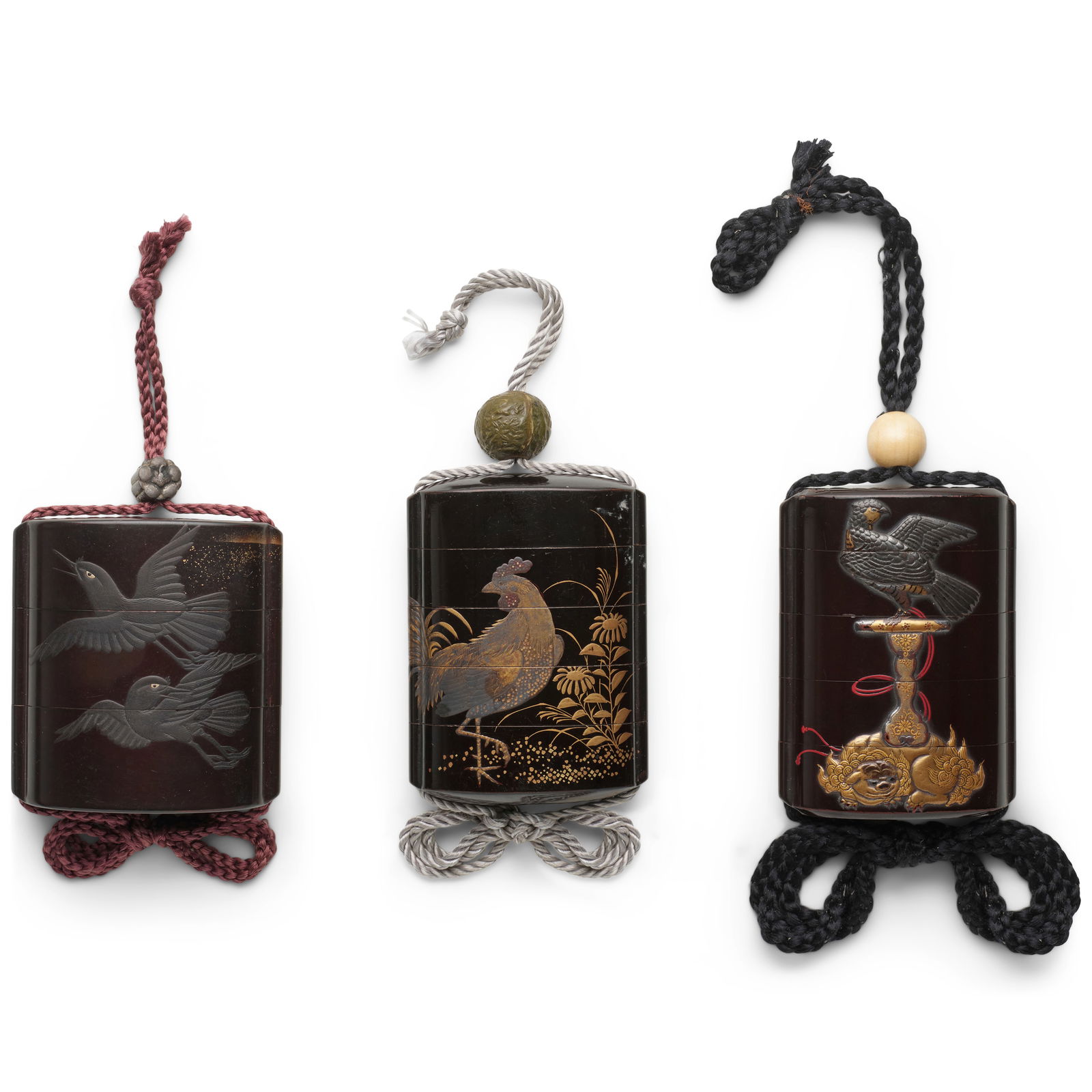 THREE BLACK-LACQUER INRŌ (MEDICINE CONTAINERS) Edo period (1615-1868), 18th/19th century (3): THREE BLACK-LACQUER INRŌ (MEDICINE CONTAINERS) Edo period (1615-1868), 18th/19th century All of rounded rectangular or ovoid plan with applied himotōshi, the first of four cases, boldly deco