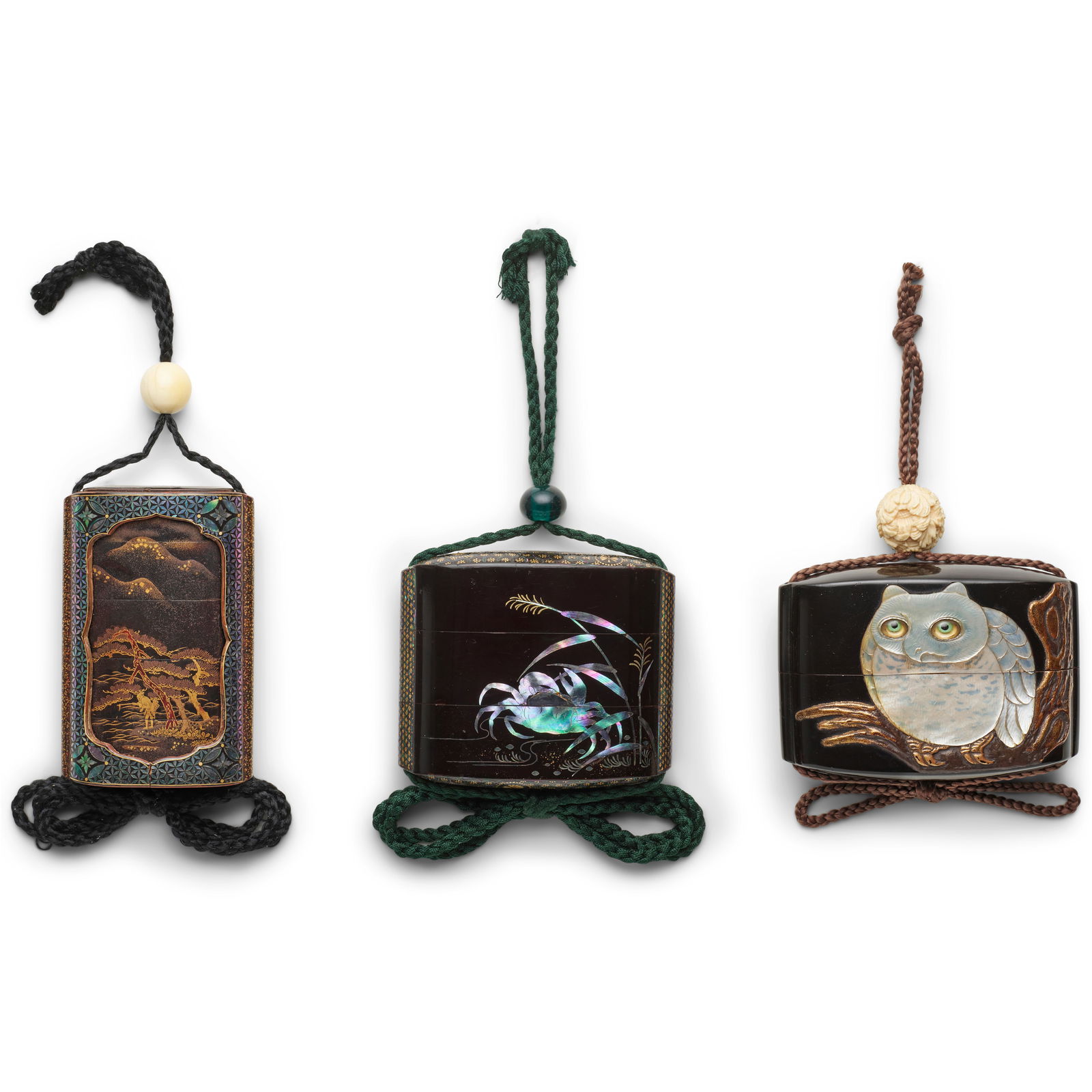 THREE BLACK-LACQUER INRŌ (MEDICINE CONTAINERS) Edo period (1615-1868), 19th century (3): THREE BLACK-LACQUER INRŌ (MEDICINE CONTAINERS) Edo period (1615-1868), 19th century All of rounded rectangular plan with applied himotōshi, the first a four-case sheath inrō, its outer