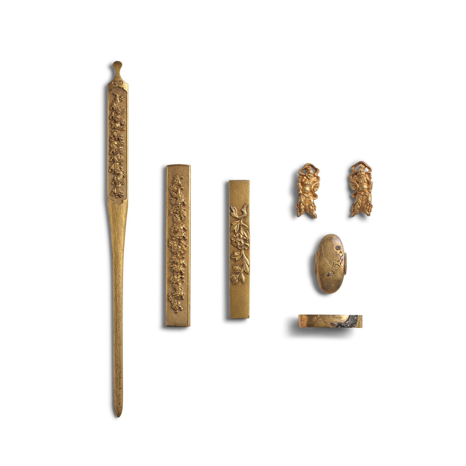 A GOLD KOZUKA-KŌGAI (KNIFE HANDLE AND HAIRPIN) SET, A GOLD KOZUKA (KNIFE HANDLE), A PAIR OF...: A GOLD KOZUKA-KŌGAI (KNIFE HANDLE AND HAIRPIN) SET, A GOLD KOZUKA (KNIFE HANDLE), A PAIR OF GOLD MENUKI (HILT GRIPS), AND A GOLD AND MIXED-METAL FUCHI-GASHIRA (HILT COLLAR AND POMMEL) Edo period