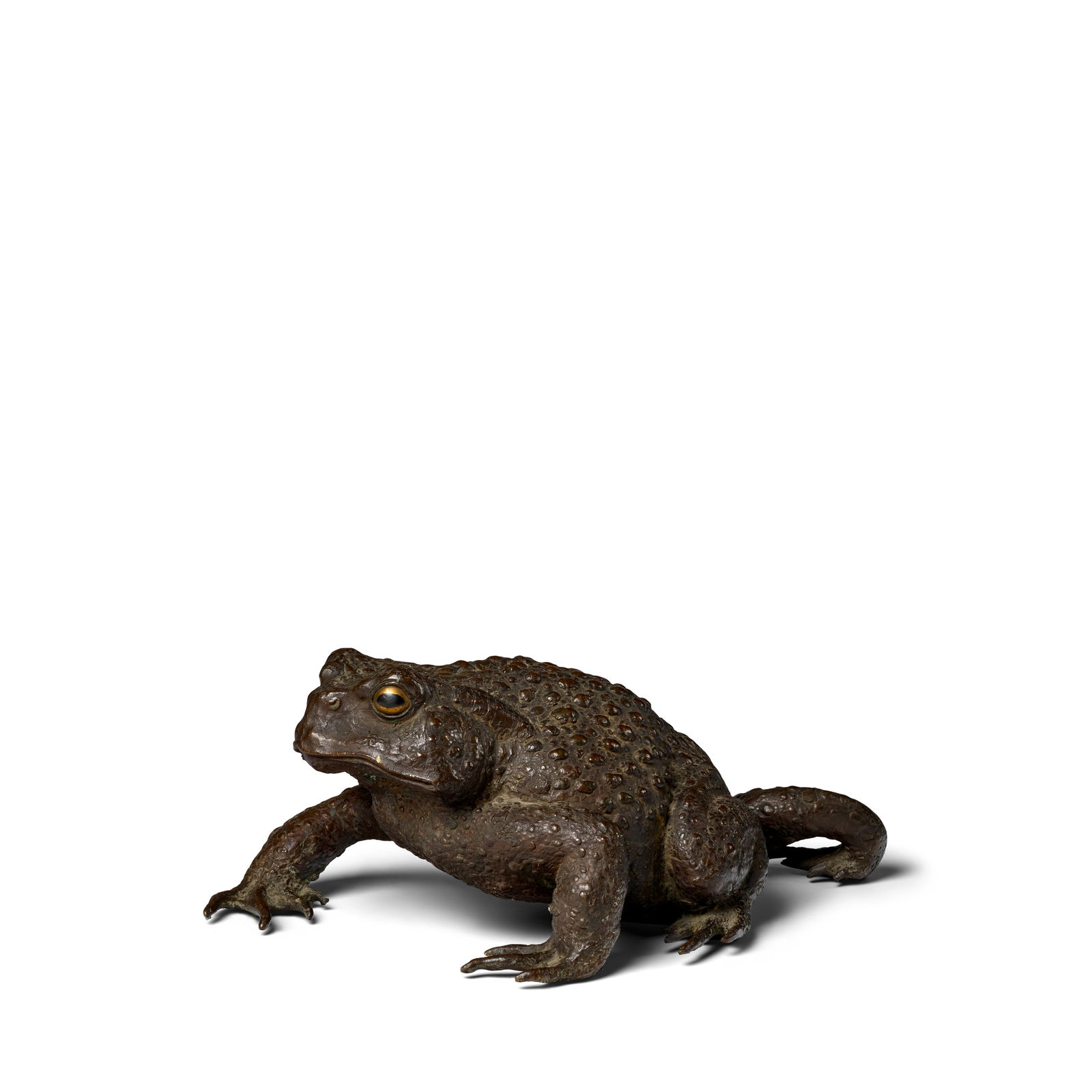UNPŌ (DATES UNKNOWN) A Large Bronze Model of a Toad Meiji (1868-1912) or Taisho (1912-1926)...: UNPŌ (DATES UNKNOWN) A Large Bronze Model of a Toad Meiji (1868-1912) or Taisho (1912-1926) era, 19th/20th century Cast as a toad with his right rear leg outstretched as he crawls, his eyes finis