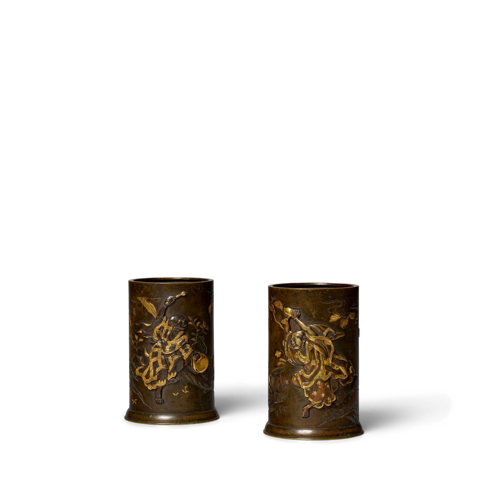 KUMAGAYA OF KYOTO A Pair of Small Bronze Brush Pots Meiji era (1868-1912), late 19th/early 20th ...: KUMAGAYA OF KYOTO A Pair of Small Bronze Brush Pots Meiji era (1868-1912), late 19th/early 20th century Both with designs of Rakan in inlay of shibuichi and shakudō, rims and additional decoratio