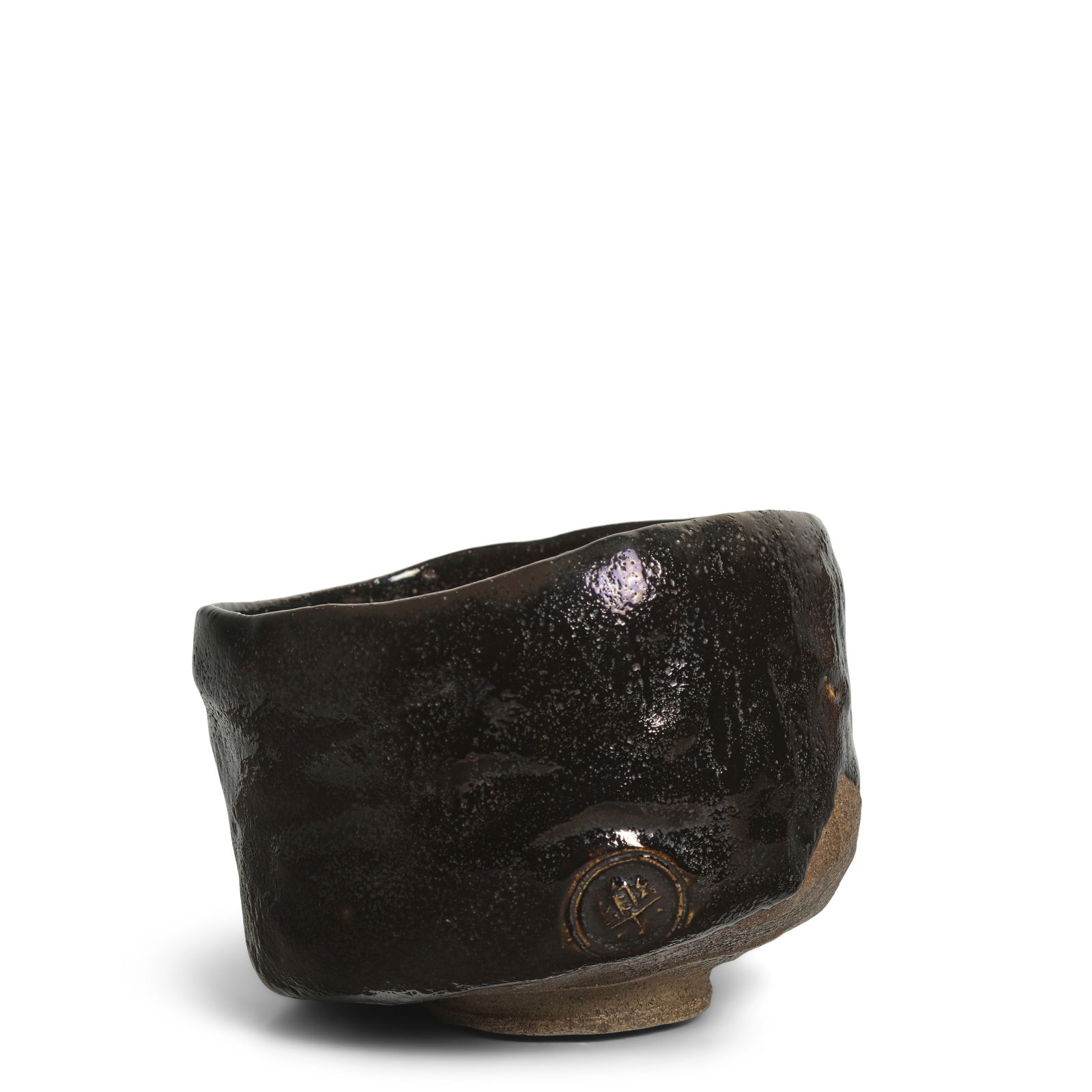 RAKU RYŌNYŪ (KICHIZAEMON IX, 1756-1834) A Black Raku Ware Tea Bowl Edo period (1615-18...: RAKU RYŌNYŪ (KICHIZAEMON IX, 1756-1834) A Black Raku Ware Tea Bowl Edo period (1615-1868), before 1811 Chawan mostly covered in a lustrous and micro-speckled black glaze, the unglazed portio
