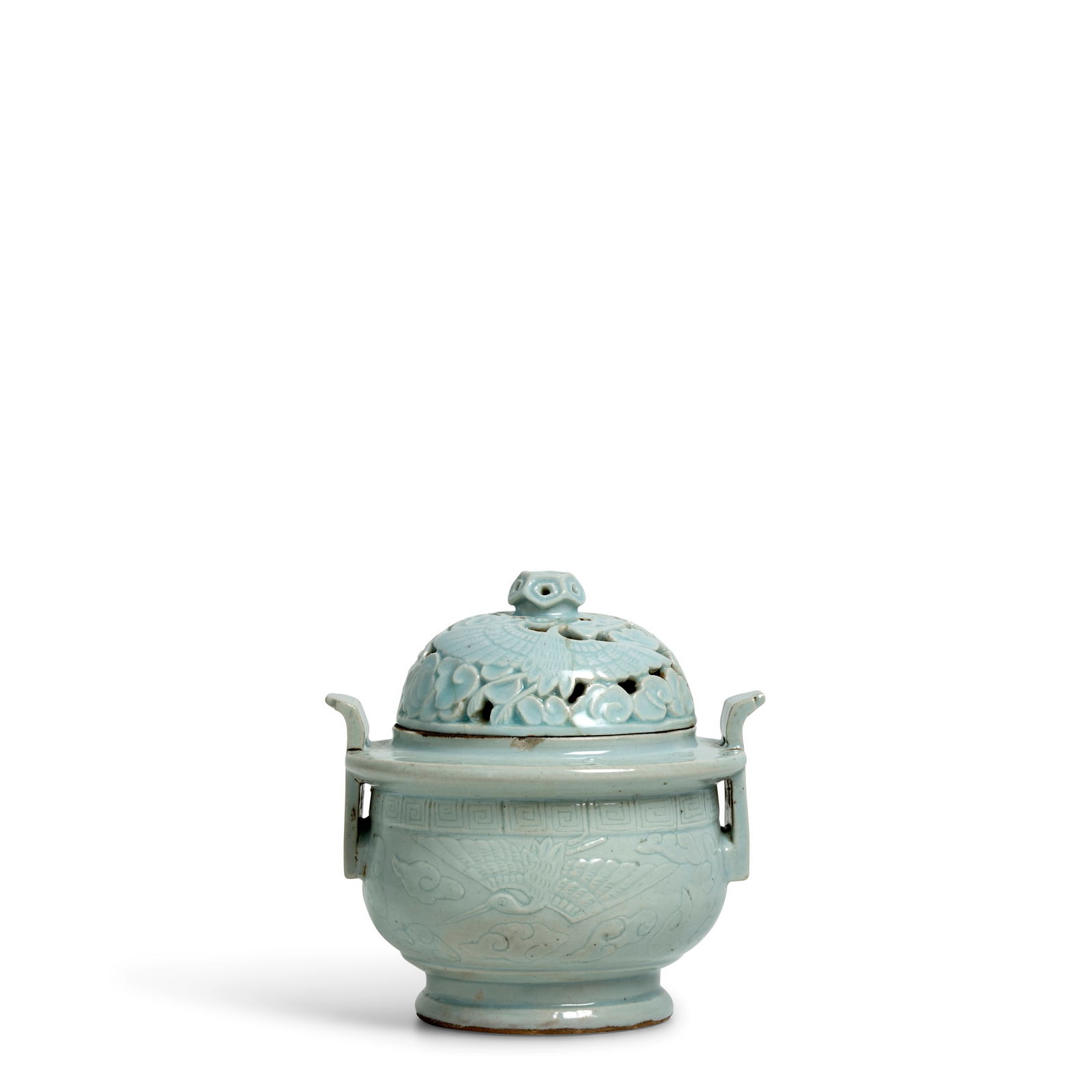 A RETICULATED WHITE PORCELAIN INCENSE BURNER Bunwon Kilns, Joseon dynasty (1392-1897), 19th century: A RETICULATED WHITE PORCELAIN INCENSE BURNER Bunwon Kilns, Joseon dynasty (1392-1897), 19th century Modeled after a bronze incense burner, the compressed ovoid body with two upright, pierced strap-for