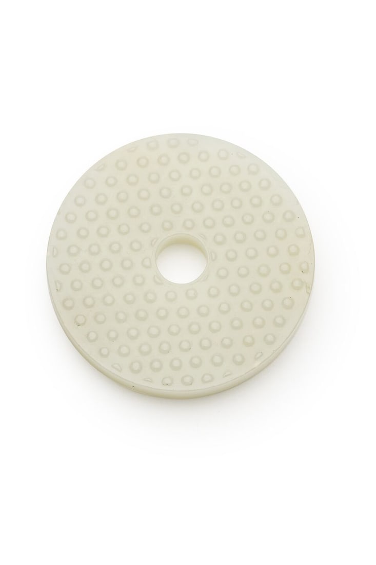 A WHITE JADE CIRCULAR 'CLOUD' PLAQUE 19th/20th century: A WHITE JADE CIRCULAR 'CLOUD' PLAQUE 19th/20th century 6.2cm diam., 59g Footnotes: 十九至二十世紀 白玉雲紋乳釘紋