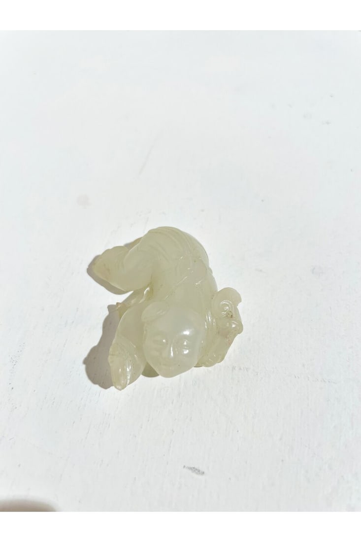 A WHITE JADE ORNAMENT OF A CHILD Qing dynasty - 8
