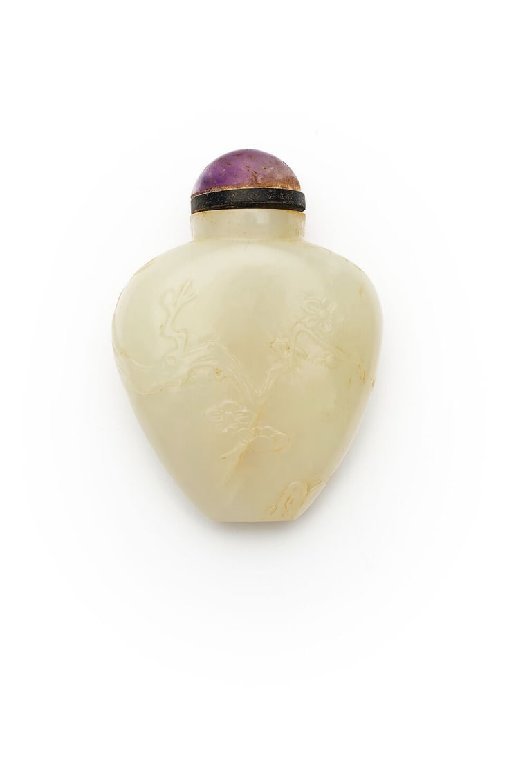 A PALE CELADON 'PLUM BLOSSOM' SNUFF BOTTLE 19th century: A PALE CELADON 'PLUM BLOSSOM' SNUFF BOTTLE 19th century Measured without the stopper 5.4cm high, 69g Footnotes: 清十九世紀