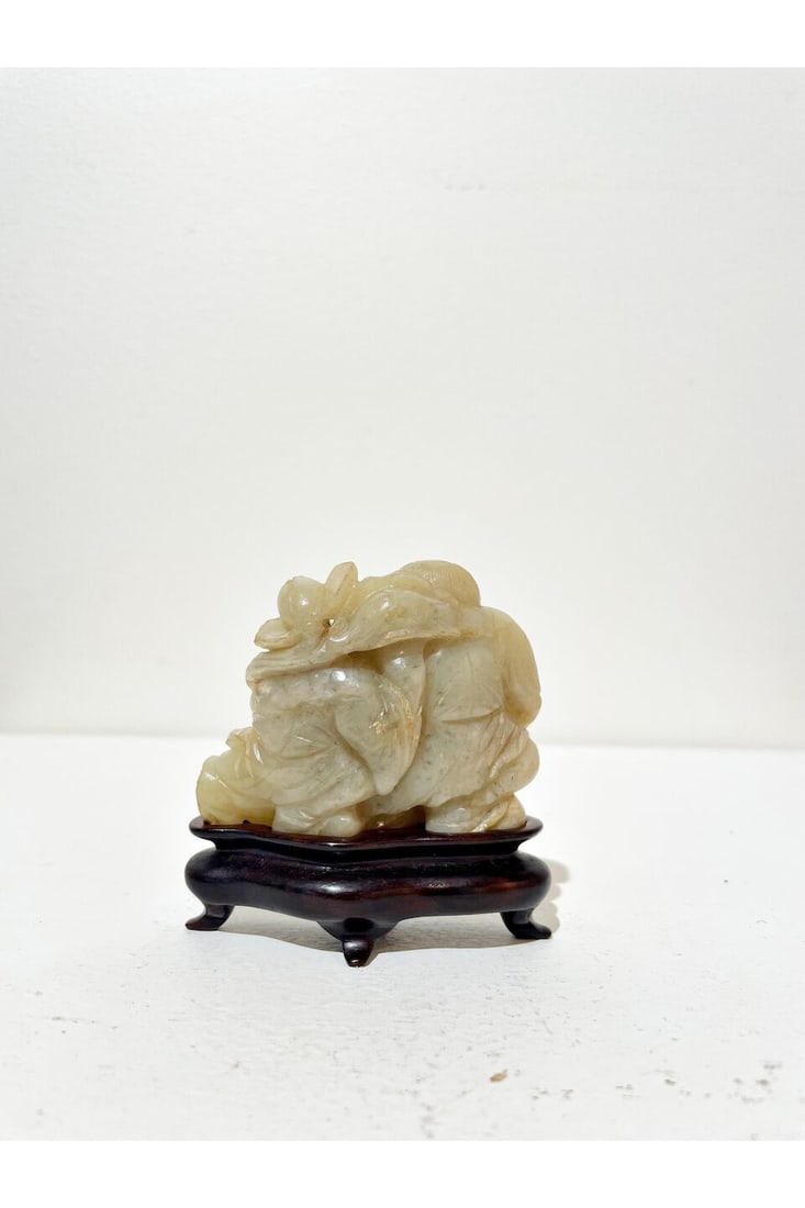 A CELADON JADE CARVING OF THE HEHE TWINS 17th/18th century - 2