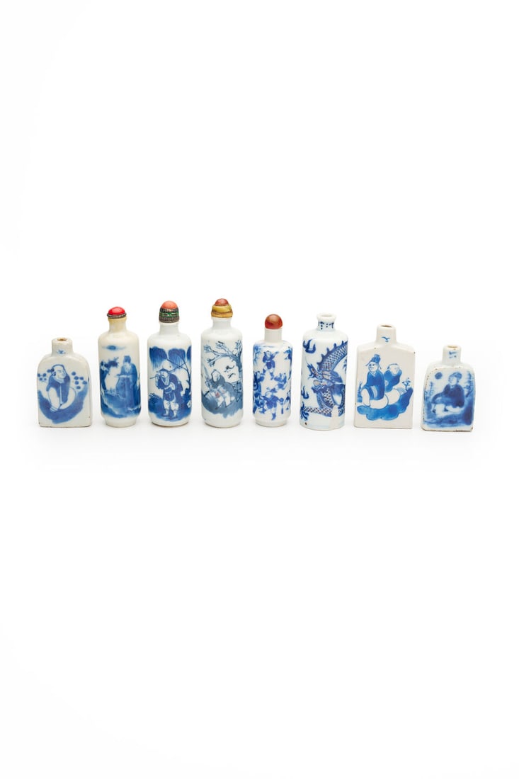 EIGHT BLUE AND WHITE SNUFF BOTTLES One with Yongzheng four-character mark, 19th century (8): EIGHT BLUE AND WHITE SNUFF BOTTLES One with Yongzheng four-character mark, 19th century Varying sizes from 5.7cm to 7.7cm high (8). Footnotes: 十九世紀