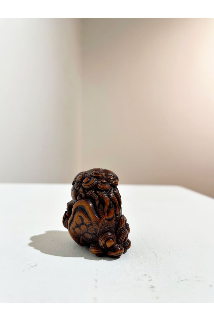 A BOXWOOD NETSUKE OF A SHISHI 19th century - 7
