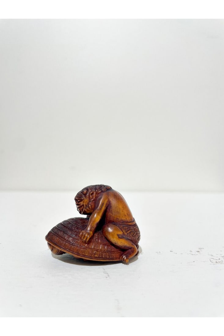 TWO WOOD AND A BRAZIL NUT NETSUKE the brazilnut netsuke signed possibly Kabuao [株青... - 2