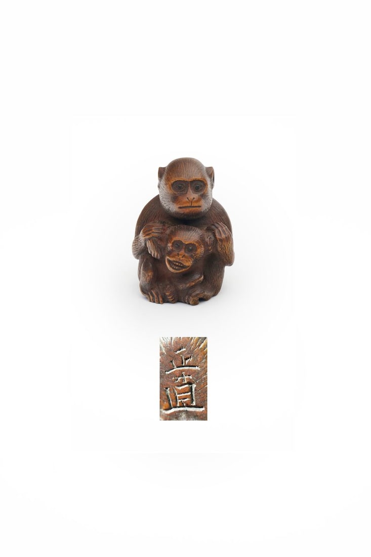 A WOOD NETSUKE OF TWO MONKEYS Signed Masanao [正直], 19th/20th century: A WOOD NETSUKE OF TWO MONKEYS Signed Masanao [正直], 19th/20th century 4.5cm high For further information on this lot please visit Bonhams.com For further information about this lot