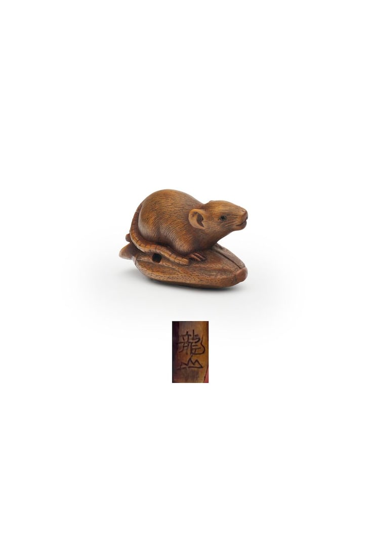 A BOXWOOD NETSUKE OF A RAT Signed Tatsuyama [龍山], 19th century: A BOXWOOD NETSUKE OF A RAT Signed Tatsuyama [龍山], 19th century 3.3cm high For further information on this lot please visit Bonhams.com For further information about this lot please