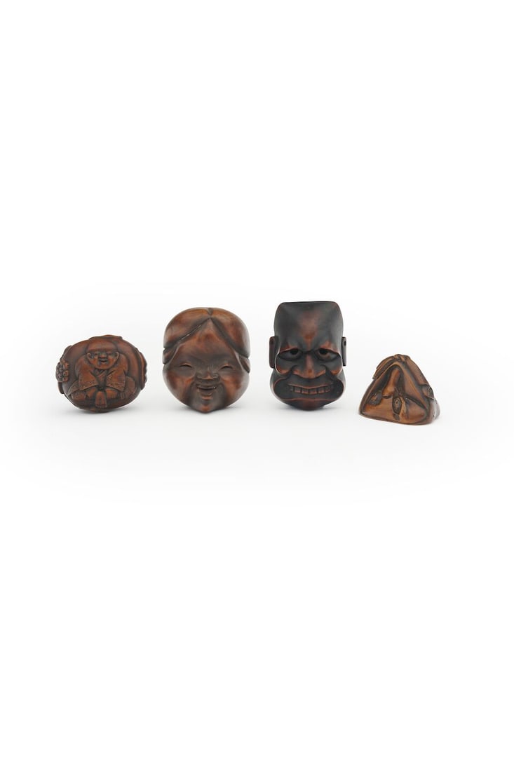 FOUR WOOD NETSUKE OF MASKS Edo period (4): FOUR WOOD NETSUKE OF MASKS Edo period Varying sizes from 2.9cm and 5.9cm high (4). For further information on this lot please visit Bonhams.com For further information about this lot please visit