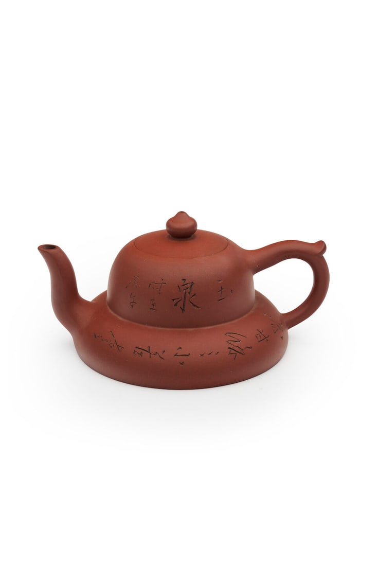 A YIXING 'PLUM BLOSSOMS' TEA POT Seal marks of Shi Liansheng (1880-1950), 20th century: A YIXING 'PLUM BLOSSOMS' TEA POT Seal marks of Shi Liansheng (1880-1950), 20th century 17.0cm long Footnotes: 二十世紀