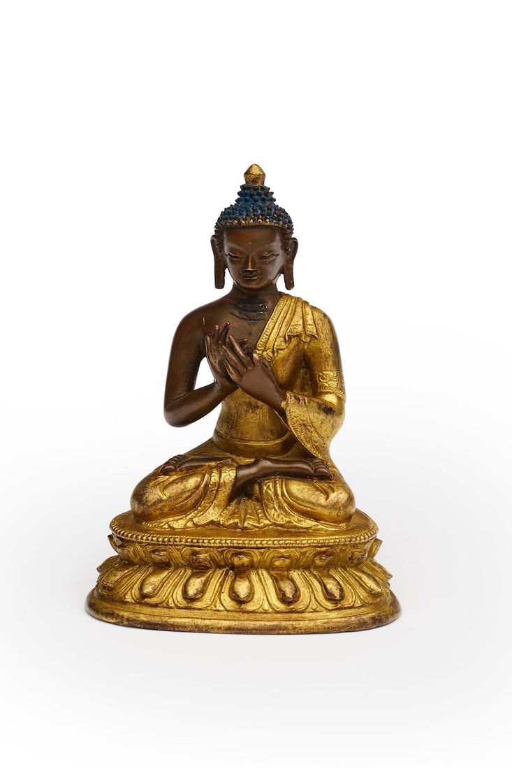 A GILT COPPER ALLOY FIGURE OF VAIROCANA BUDDHA 19th/20th century: A GILT COPPER ALLOY FIGURE OF VAIROCANA BUDDHA 19th/20th century 10.3cm long Footnotes: 十九至二十世紀