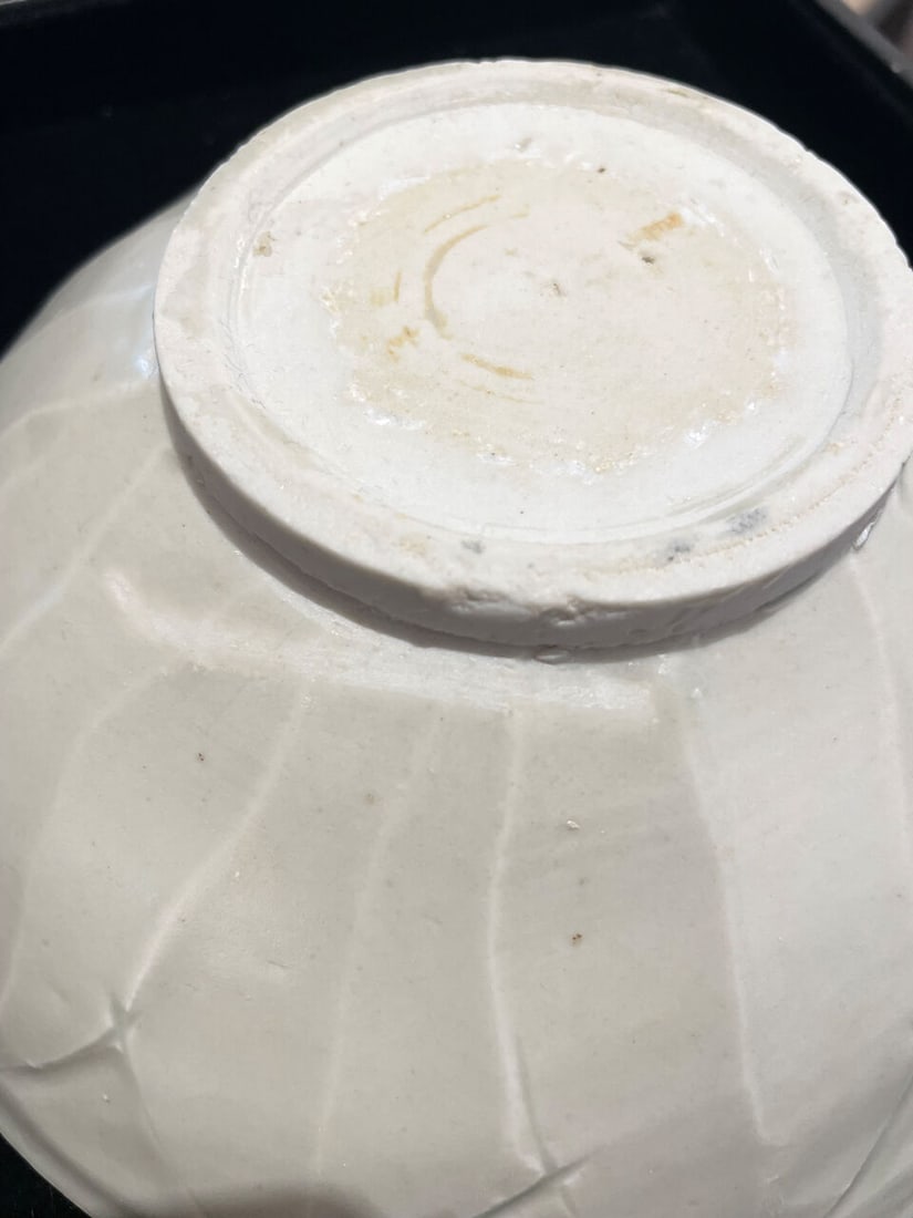 A QINGBAI 'LOTUS PETAL' BOWL 10th/11th century - 2