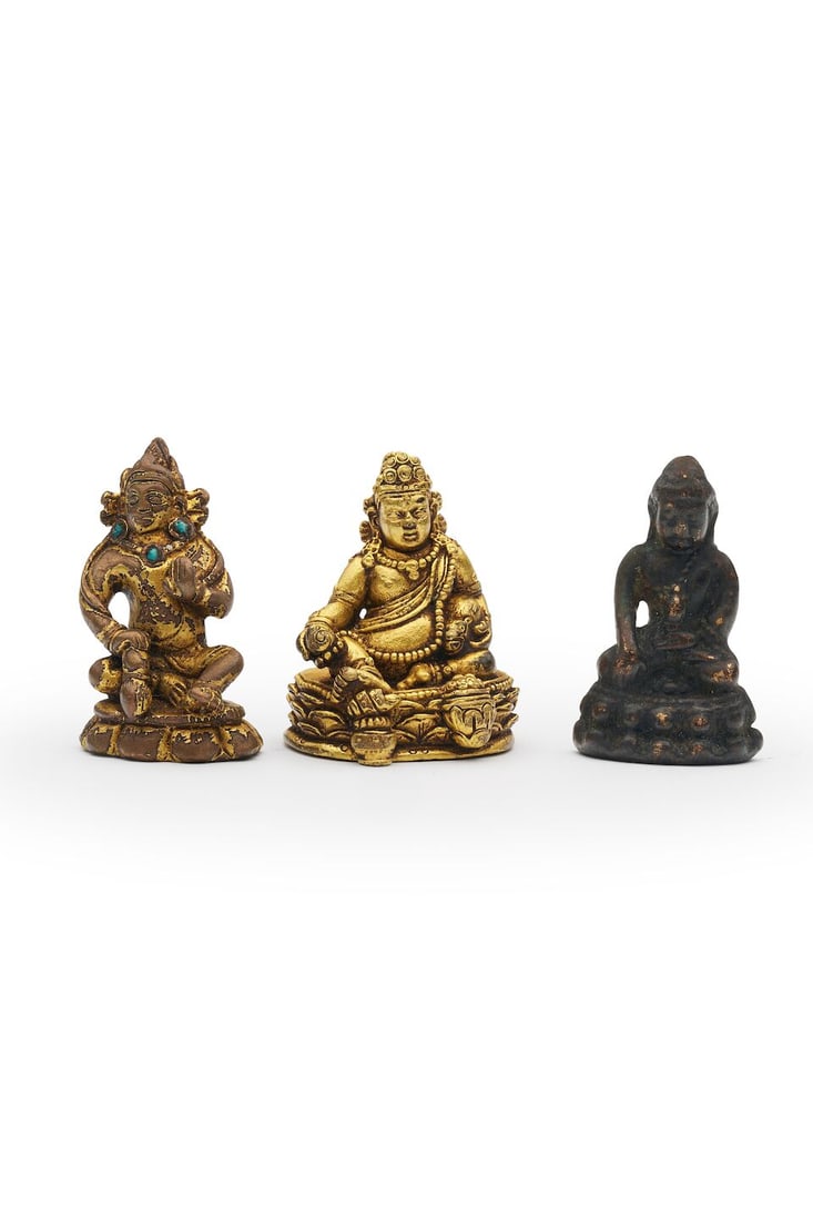 THREE COPPER ALLOY FIGURES OF YELLOW AND BLACK JAMBHALA AND BHAISAJYAGURU 19th/20th century (3): THREE COPPER ALLOY FIGURES OF YELLOW AND BLACK JAMBHALA AND BHAISAJYAGURU 19th/20th century 3.4cm high, 3.7cm high, 3.3cm high 
