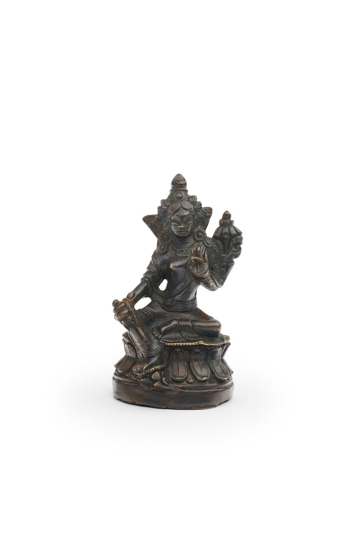 A COPPER ALLOY FIGURE OF A GREEN TARA 19th/20th century: A COPPER ALLOY FIGURE OF A GREEN TARA 19th/20th century 8.5cm high Footnotes: 十九/二十世紀 銅綠度母坐像 For further