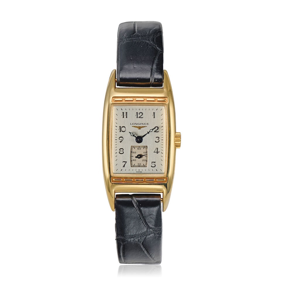 Longines. A lady's 18K gold quartz wristwatch Belle Arti, Ref: L2 194 6, Purchased 6th March 2010: Longines. A lady's 18K gold quartz wristwatch Model: Belle Arti Reference: L2 194 6 Date: Purchased 6th March 2010 Movement: 11-jewel Cal.L.178.2 quartz Dial: Silvered Case: Brushed and polished recta