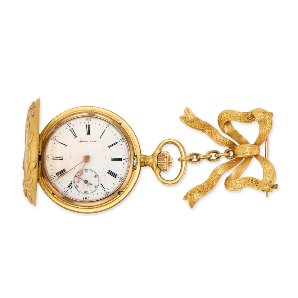 Longines. An 18K gold keyless wind full hunter pocket watch with continental gold brooch: Longines. An 18K gold keyless wind full hunter pocket watch with continental gold brooch Movement: Swiss lever, No.2420866 Dial: White Case: Brushed round, diamond set town scene and foliate design to