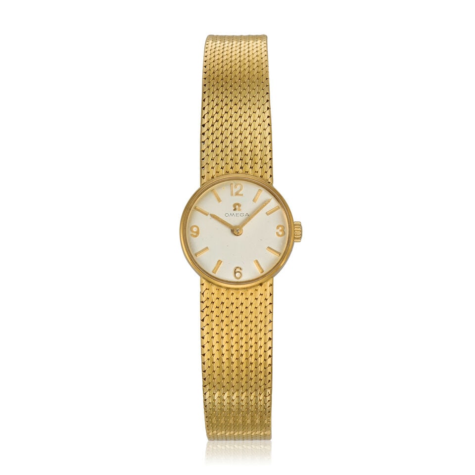 Omega. A lady's 18K gold manual wind bracelet watch London Hallmark for 1965 (1 of 3)