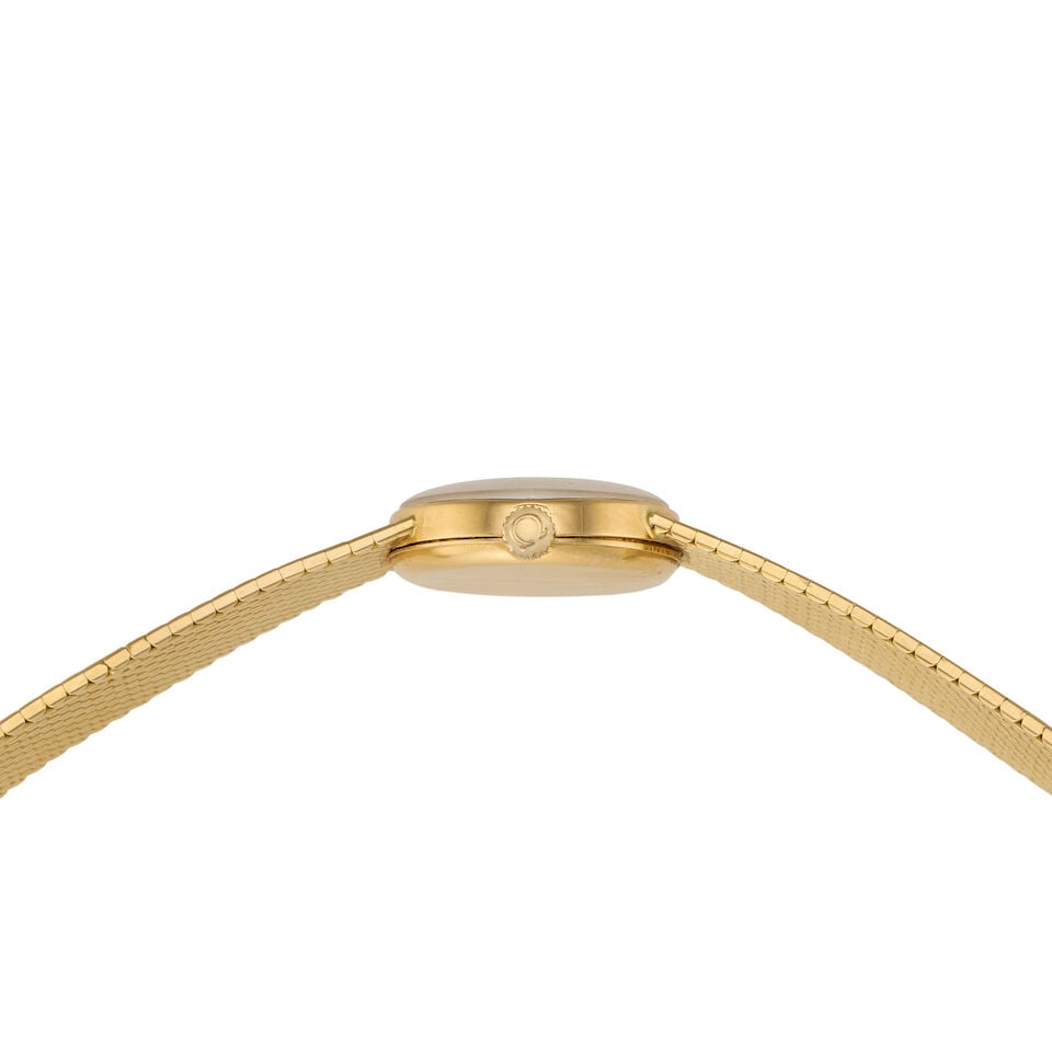 Omega. A lady's 18K gold manual wind bracelet watch London Hallmark for 1965 - 2
