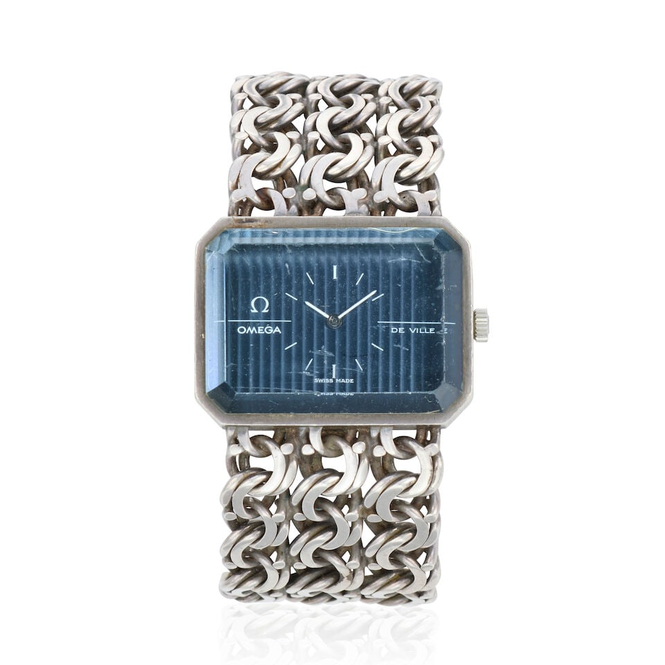 Omega. A lady's silver manual wind bracelet watch De Ville, Ref: 8272, Circa 1973: Omega. A lady's silver manual wind bracelet watch Model: De Ville Reference: 8272 Date: Circa 1973 Movement: 17-jewel Cal.625 manual wind, No.38 061531 Dial: Blue Case: Polished octagonal form Strap/B