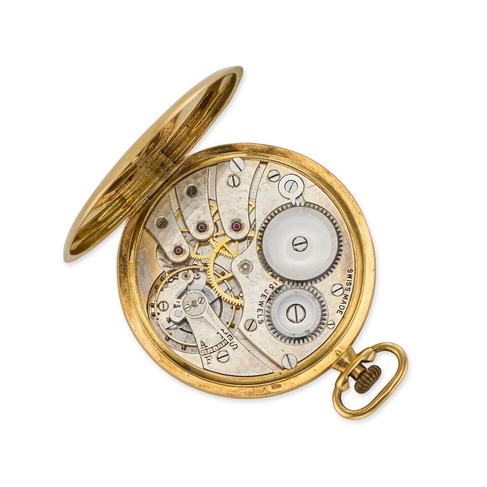 An 18K gold keyless wind open face pocket watch with an 18K gold chain Glasgow Import mark for 1926 - 2